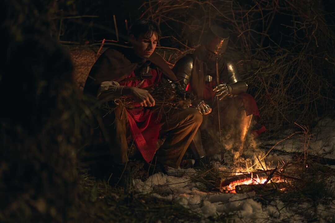 gaucho playing guitar at campfire